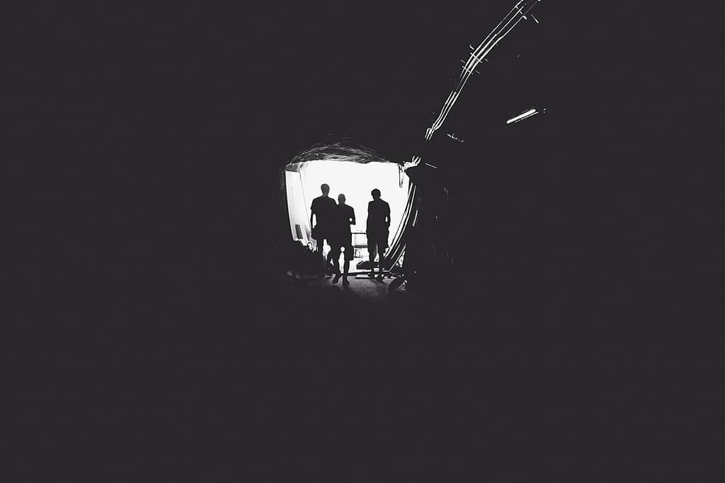 Silhouette of People in Open Door