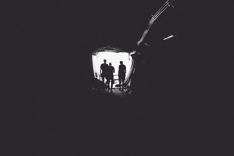 Silhouette of People in Open Door