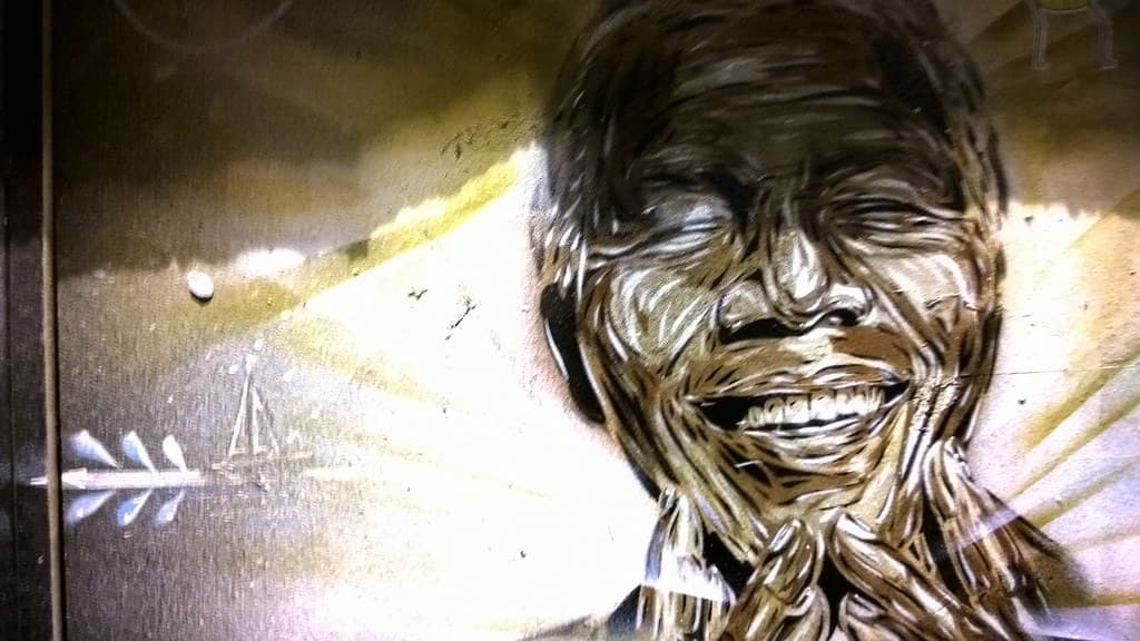 Nelson Mandela graffiti and Brick Lane in London