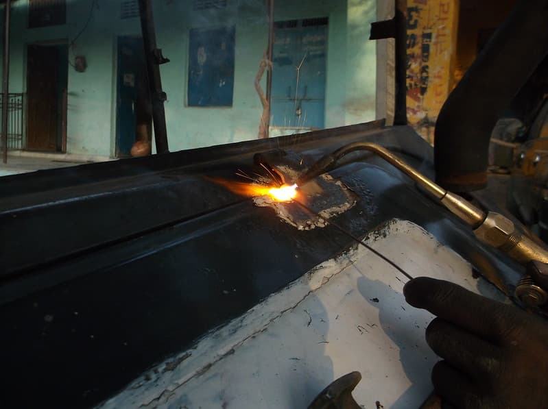 Welder in the Process of Welding