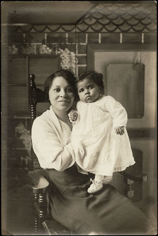 Woman holding a child