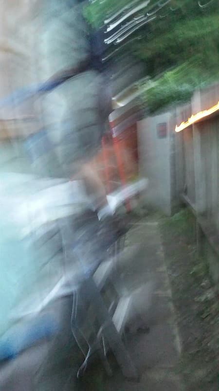 Stephen working abstract, blurred motiin, Seattle, Washington, USA