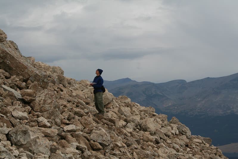 Scanning a talus slope for signs of pikas (Citizen Science)