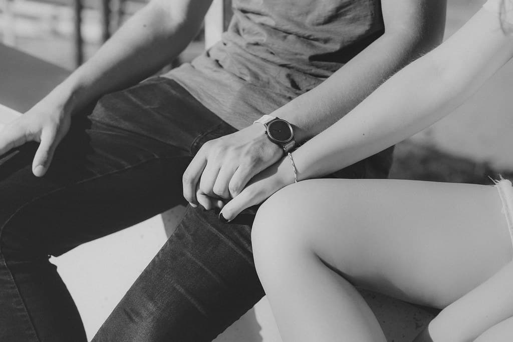 A couple holding hands