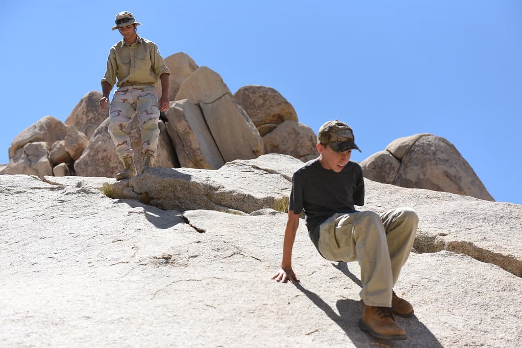 Hiker down climbing