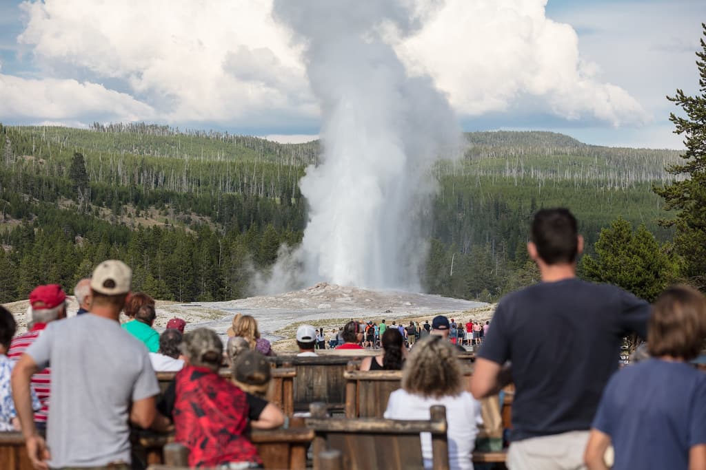 People watching Old Faithful erupt from the Old Faithful Inn (2)