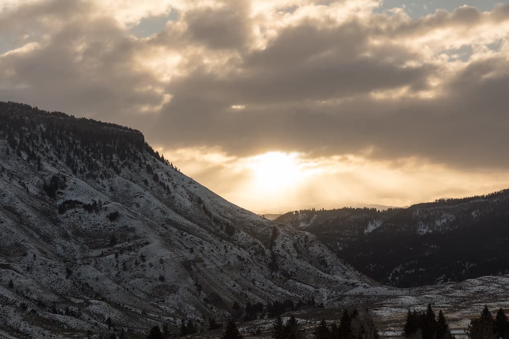 Sunrise through the clouds from Mammoth Hot Springs
