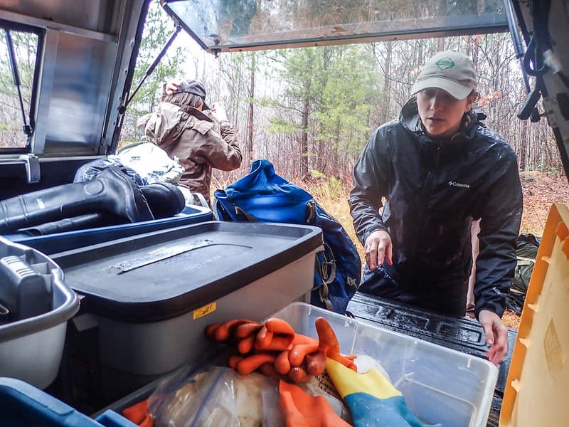 Katherine Caldwell pulls gear from her truck
