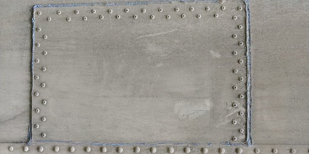 Dirty riveted and welded metal