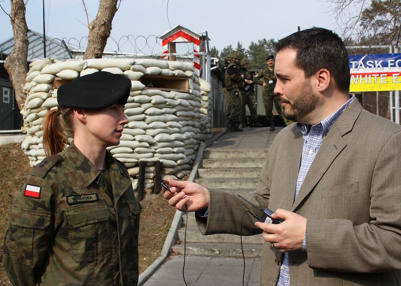 Global News Network reporter interviewing Polish PAO