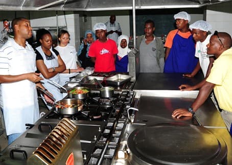 Volunteers, Students 'Break Bread' in Arta