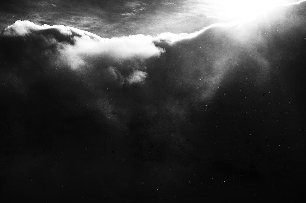 Black and White Clouds and Sun in Sky