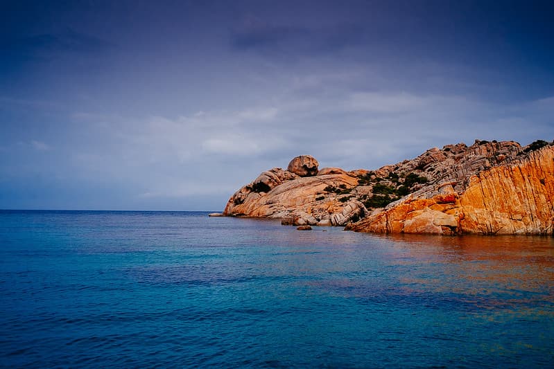 Blue Ocean Water by Rocky Outcrop