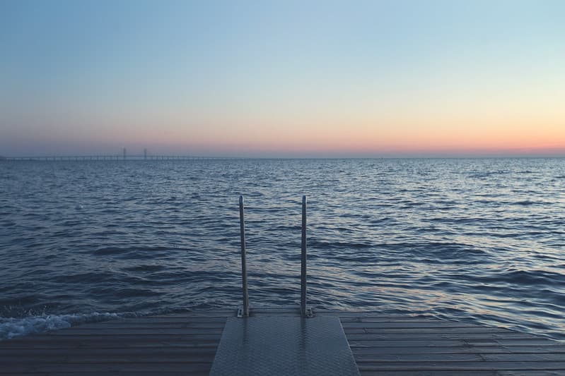 Deck with Ladder Leading to Ocean