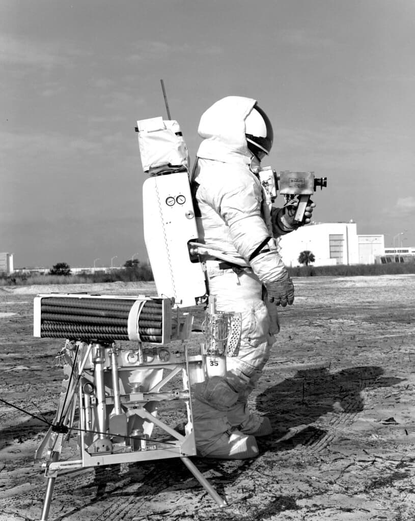 Apollo 13 EVA Walkthrough: Haise and tool carrier with drill pipes