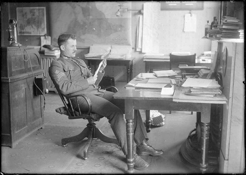 Sergeant at desk reading