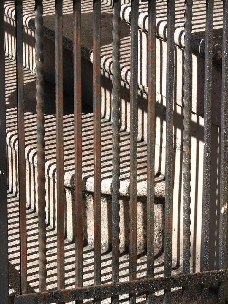 Staircase-and-railing shadow composition