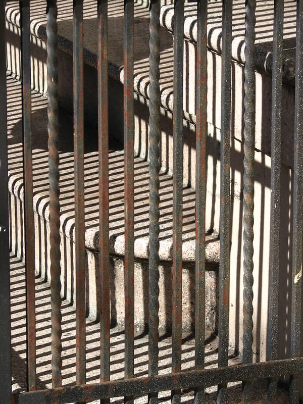 Staircase-and-railing shadow composition