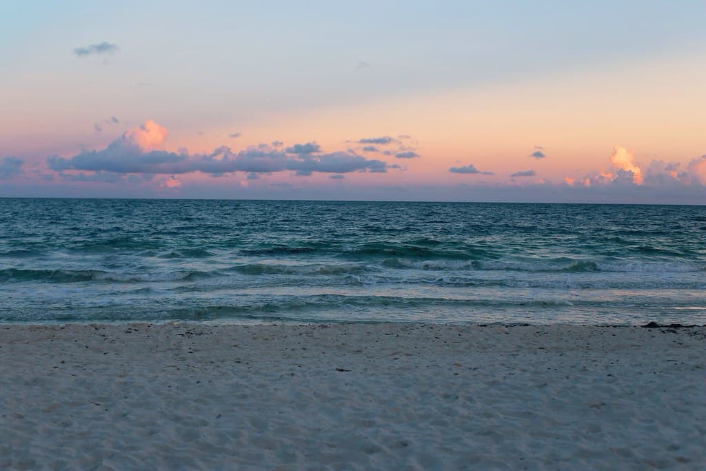 Ocean Waves on Beach at Sunset
