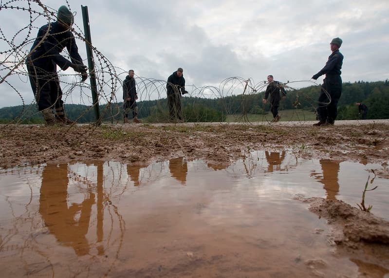 OPFOR fixing the razor wire
