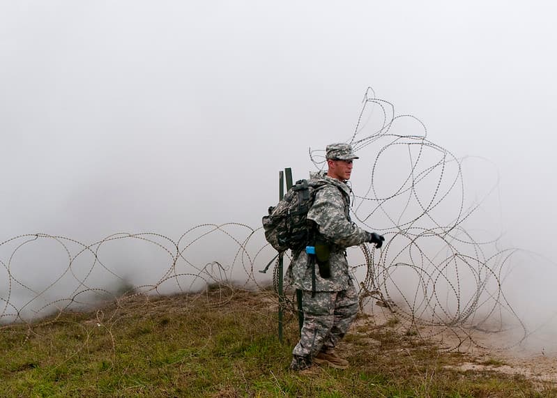 OC clearing the razor wire