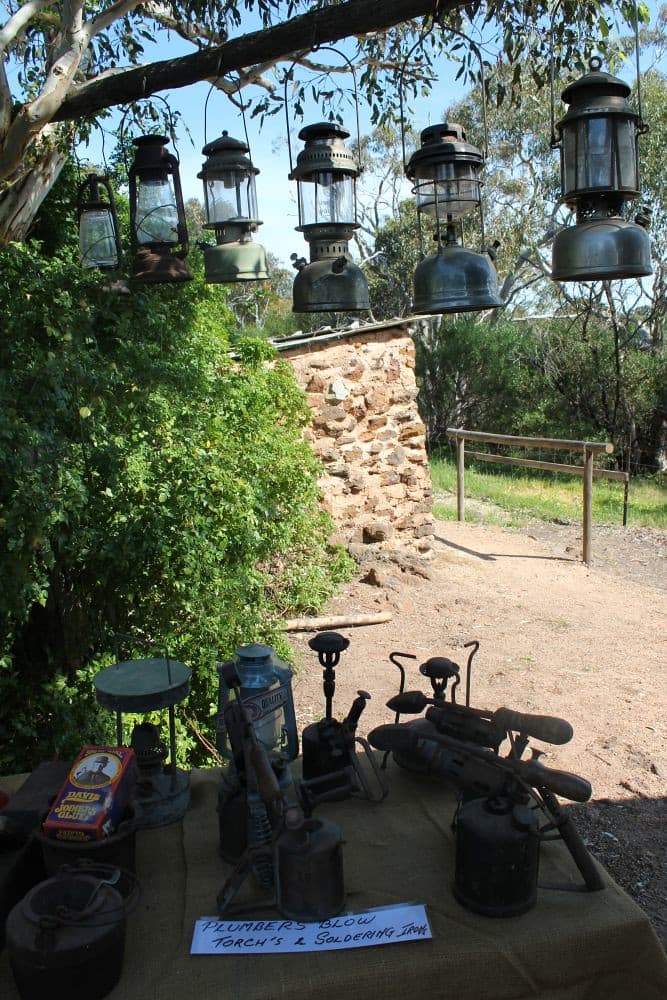 Display of plumber's tools and lanterns at Bowden's Cottage
