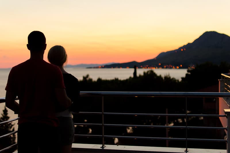 Silhouette of Couple on Balcony