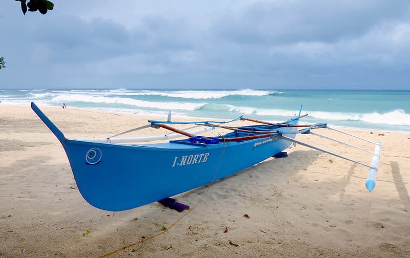 The blue fishing boat.