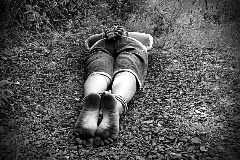 Kidnapped in forest barefoot