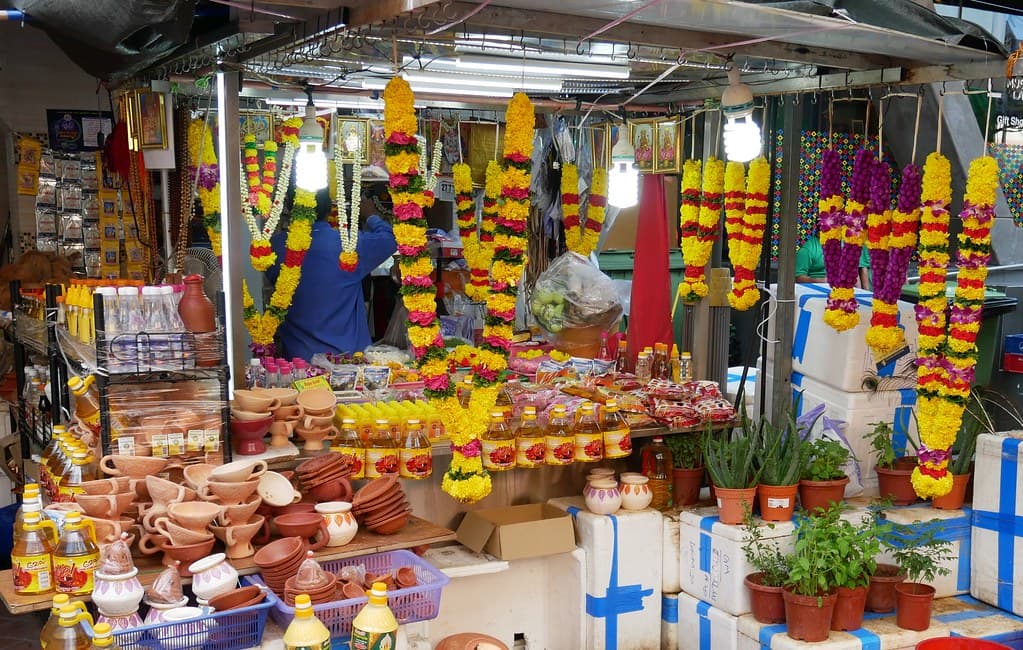 Little India - prayer items stall, including garlands, oil lamps