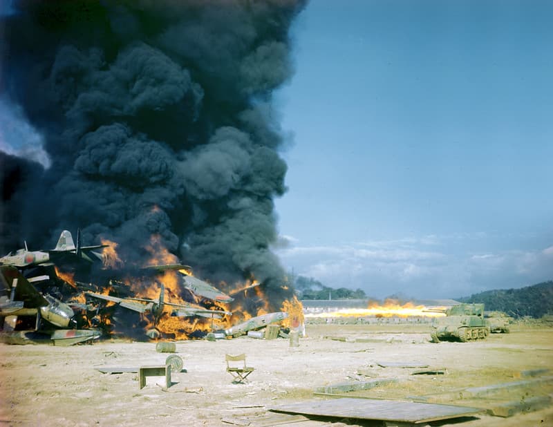 Sherman tanks set fire to Japanese aircraft