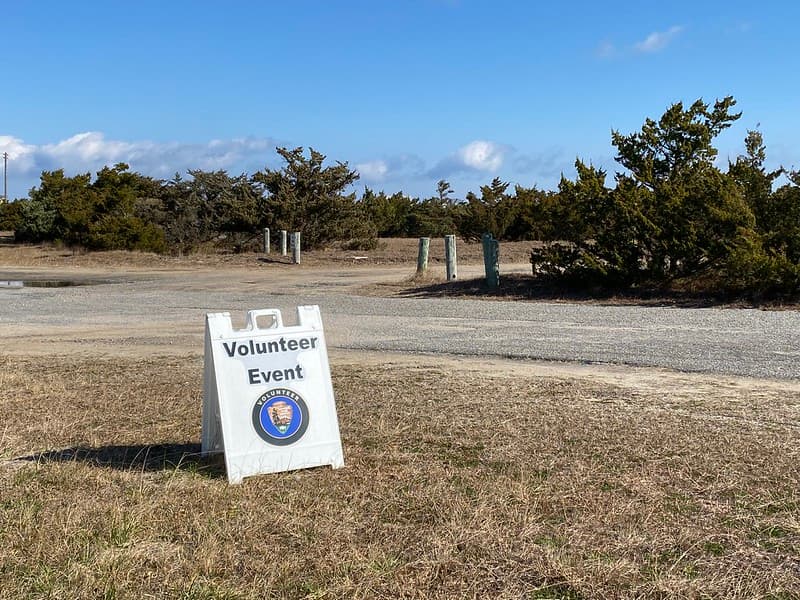 Volunteer event sign at beach cleanup 02-14-2022