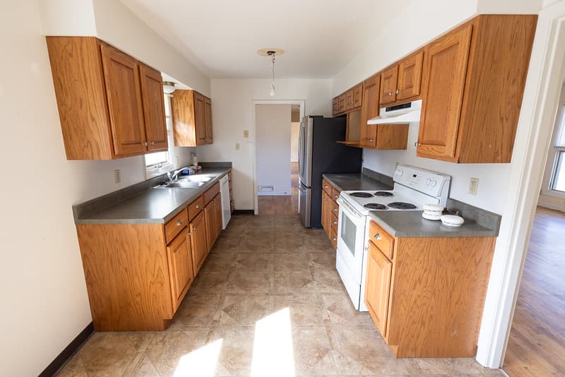 Employee housing Improvement Project Goal 2: kitchen before