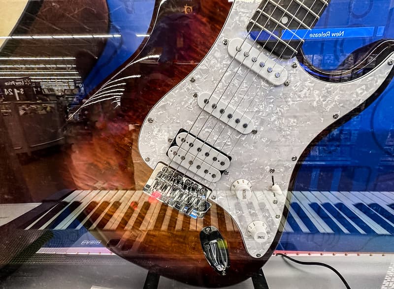 Stratocaster Guitar with keyboard reflection