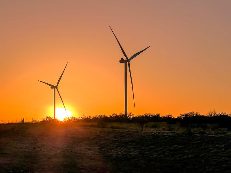 Wind turbines at sunset