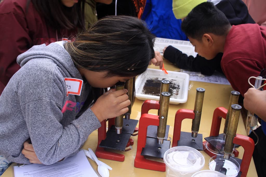 Student with microscope