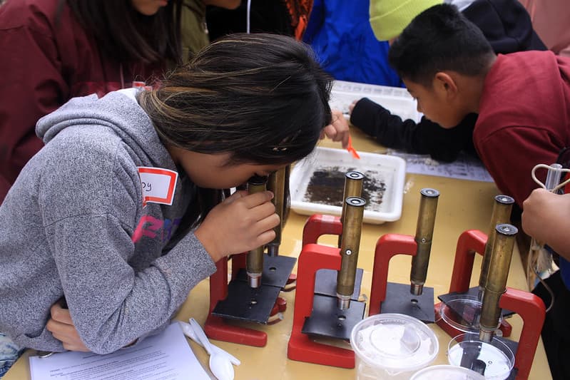 Student with microscope