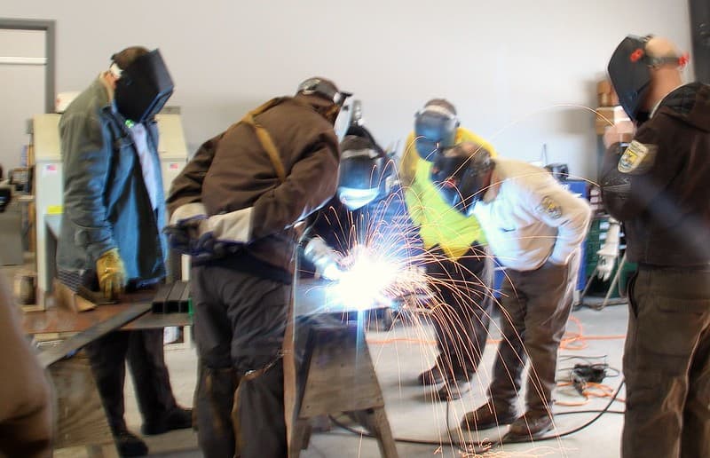 Joe Bertrand teaches welding