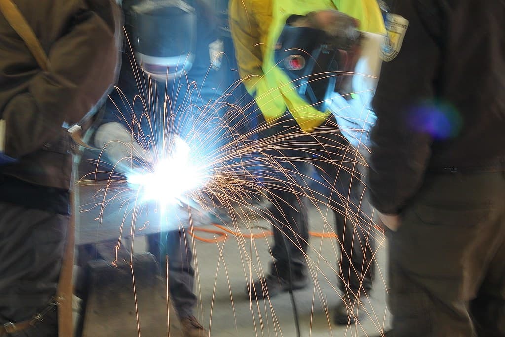 Joe Bertrand teaches welding