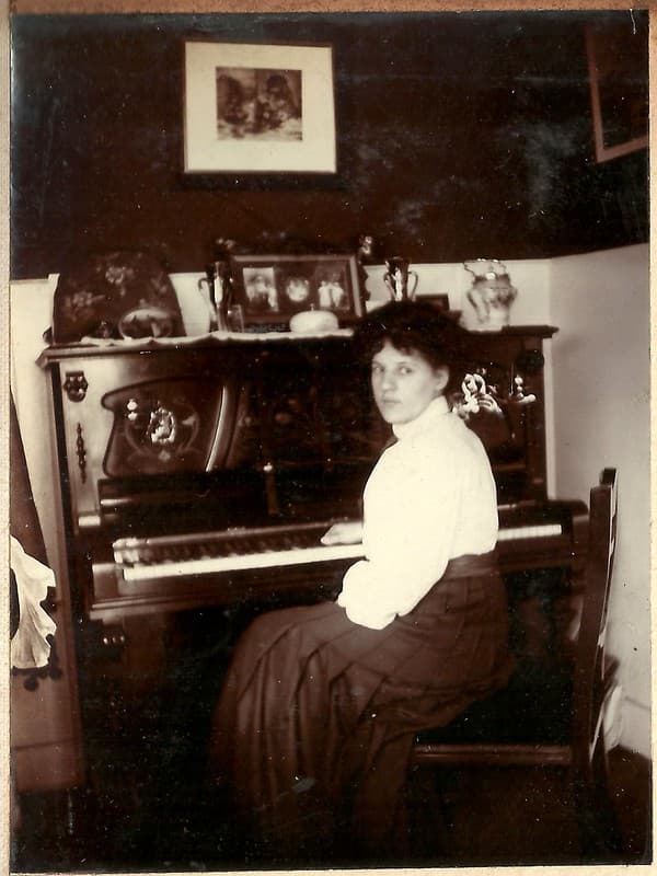Ethel Hook at her piano, c. 1907