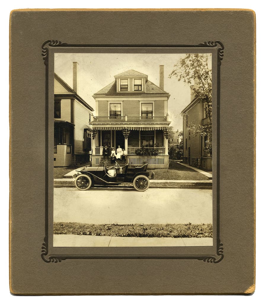 Family with car and home, Buffalo, New York c1910
