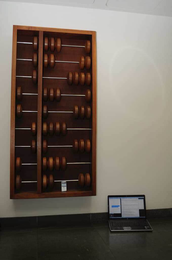 Soda Hall abacus with laptop and smartphone