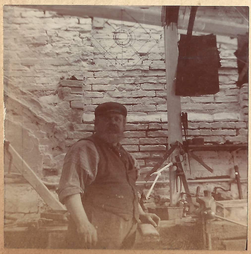 Edwardian blackmith (or other trade) in a workshop