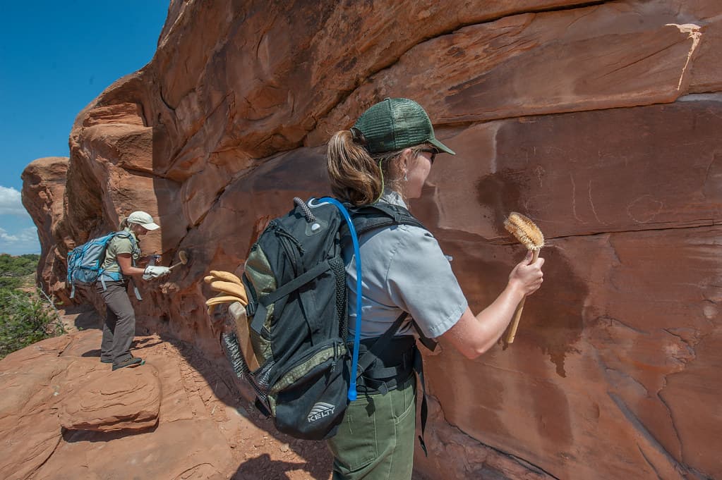 Park Staff Remove Scratched Graffiti