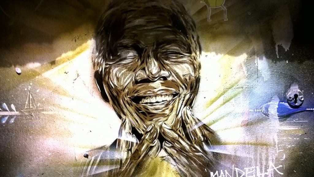 Nelson Mandela graffiti and Brick Lane in London