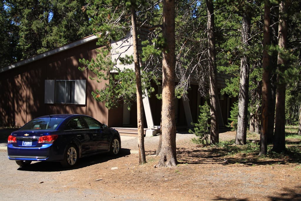 Lake Lodge, car parked in front of cabin