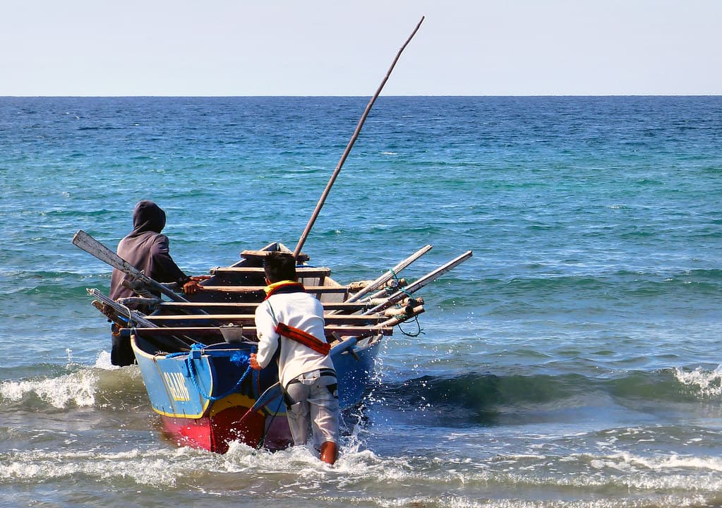 Launching the boat. Philippines.