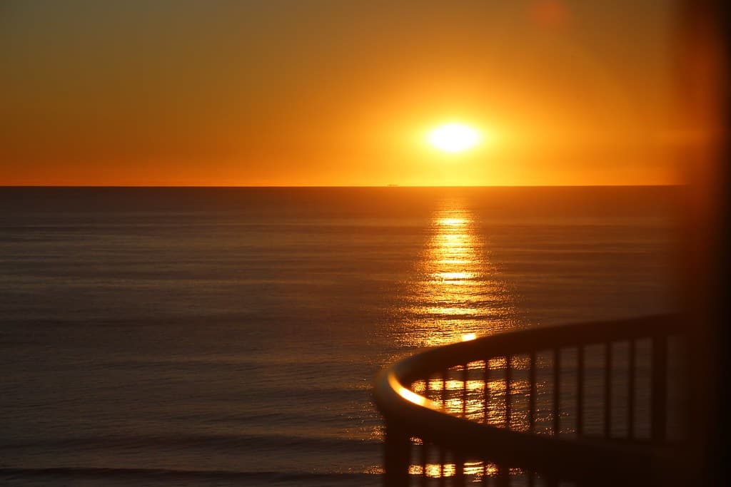 Sunrise, Day meeting Night on beach