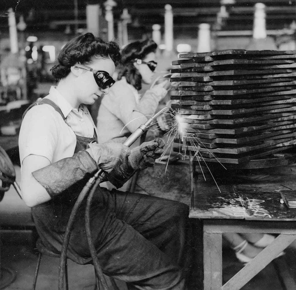 Oxy welding part of ammunition boxes, 1943