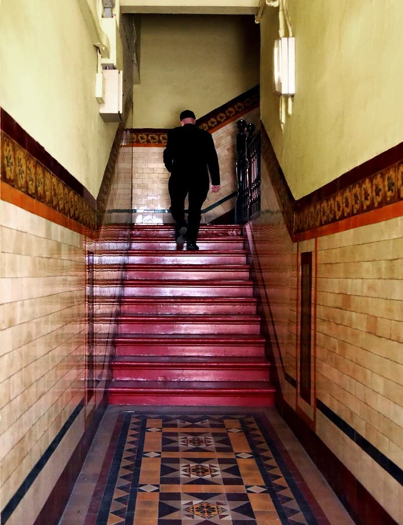 Candidate ascending a staircase